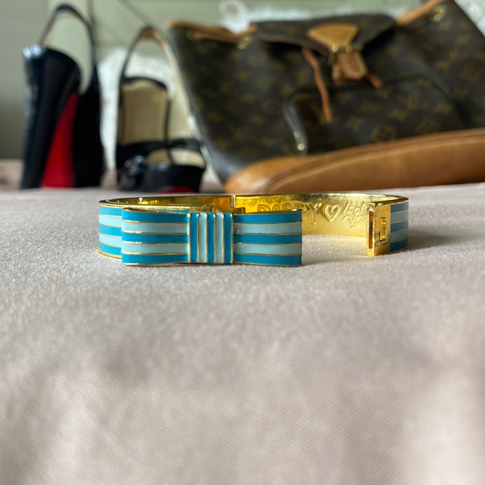 Gold Coach ribbon clip bracelet